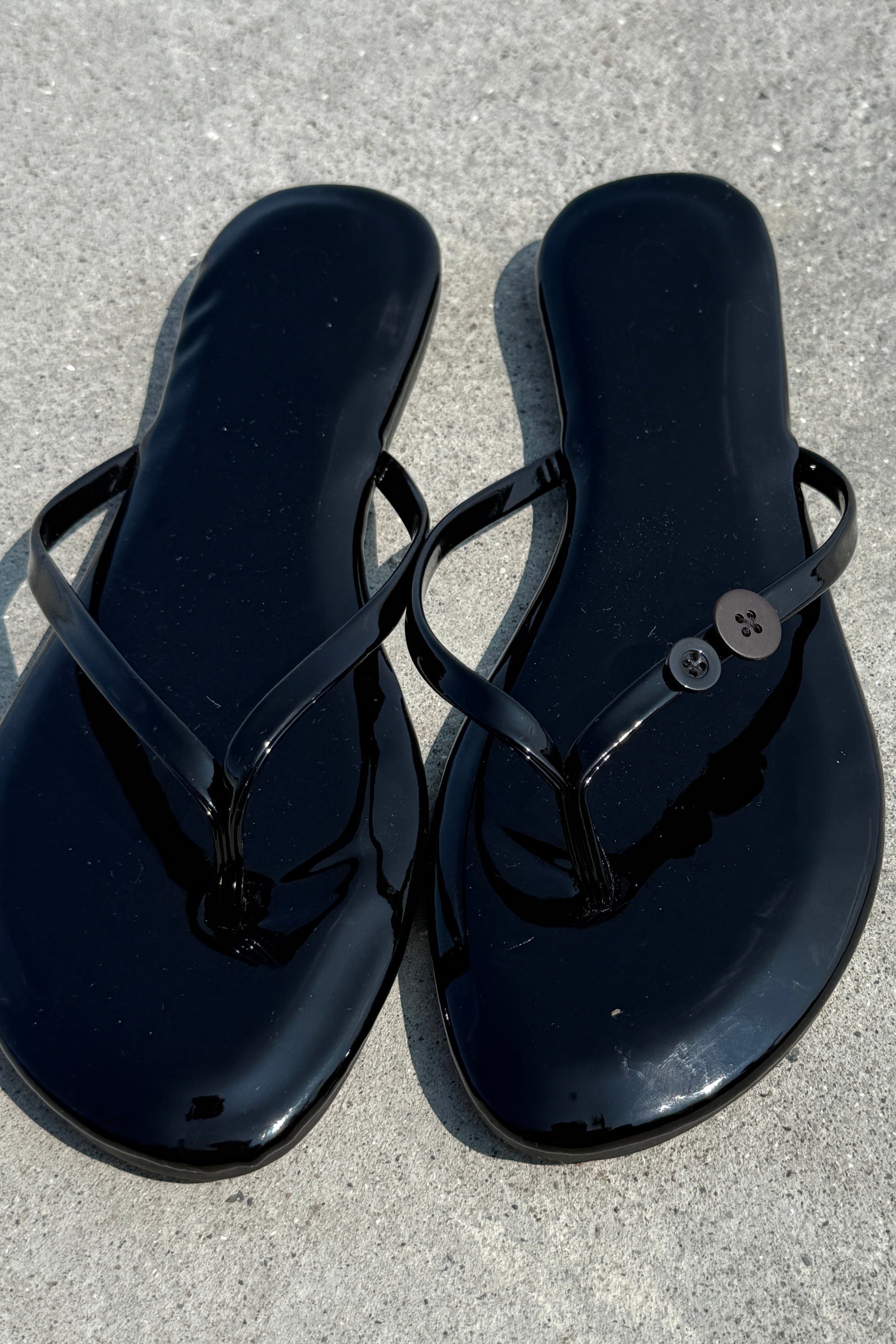 Sorte Glazed flip-flops